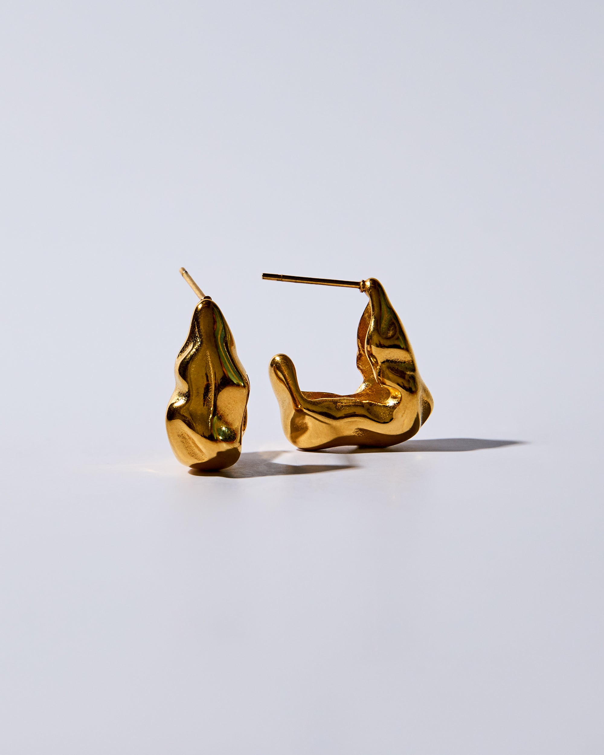 Sculpted Melt Studs Gold